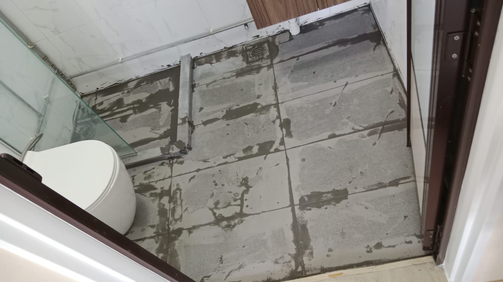 Tile grouting